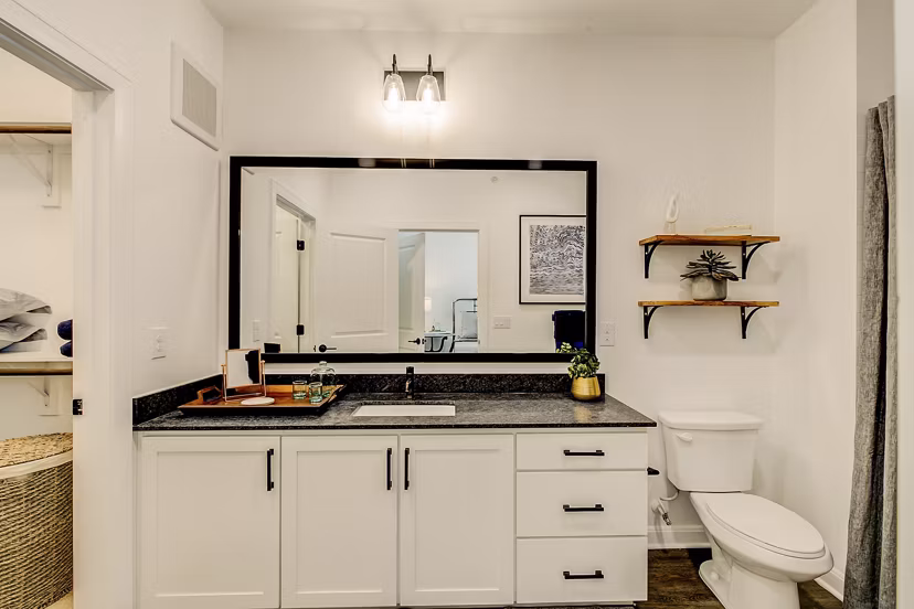 Modern bathroom featuring sleek fixtures at Elan Inwood Apartments