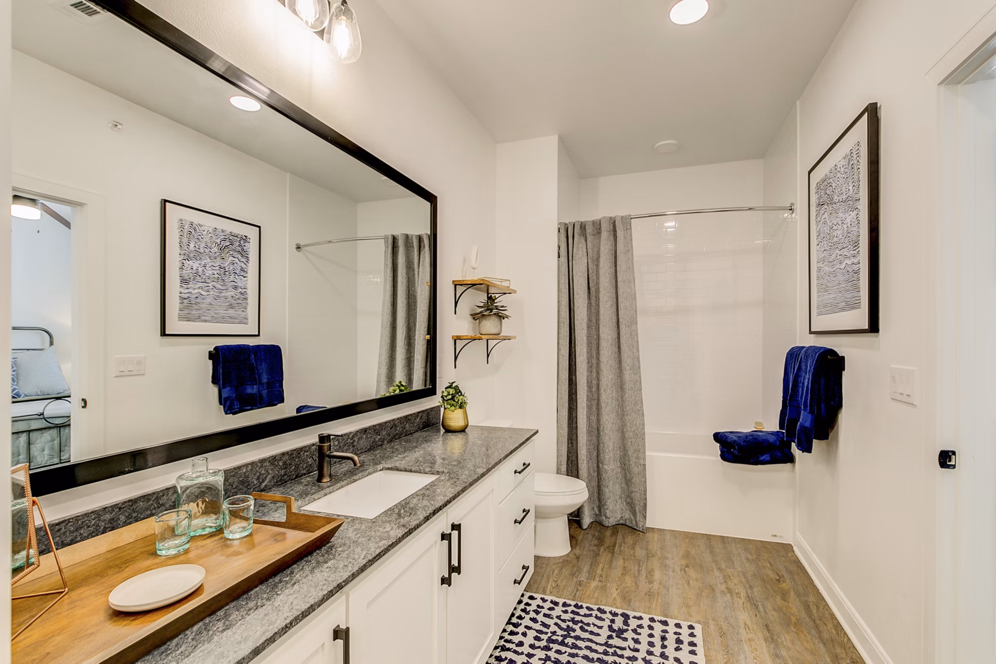 Modern bathroom with sleek fixtures at Elan Inwood Apartments, featuring stylish design and luxury amenities