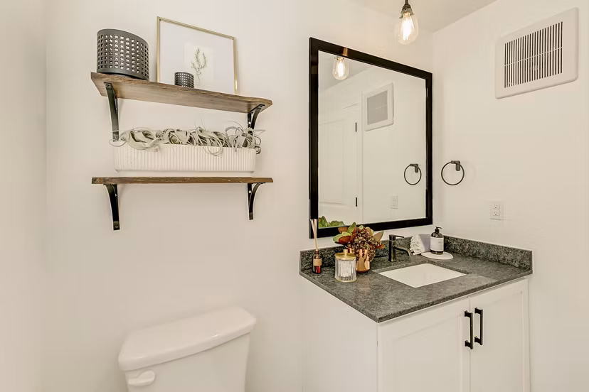 Modern bathroom with sleek fixtures at Elan Inwood Apartments, a luxury property by Greystar