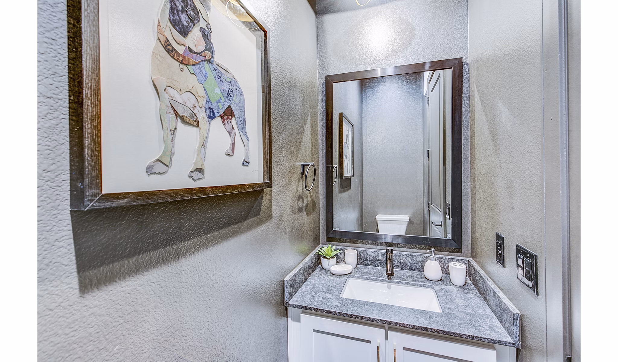 Elegant bathroom featuring modern fixtures at Elan Inwood Apartments
