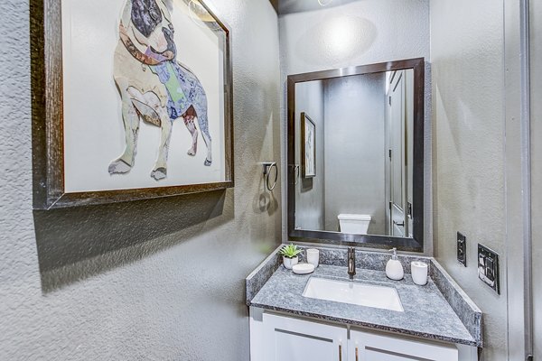 Elegant bathroom featuring modern fixtures at Elan Inwood Apartments