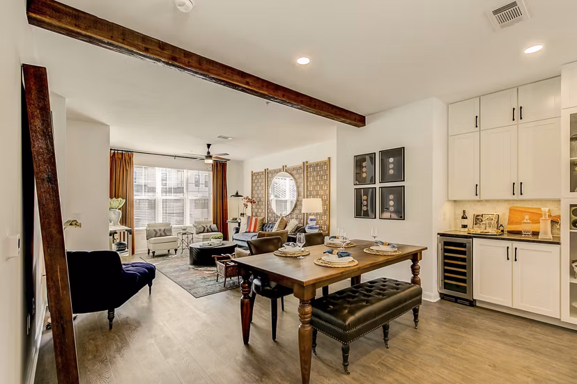 Dining area featuring modern decor and large windows at Elan Inwood Apartments, a Greystar luxury community in Dallas