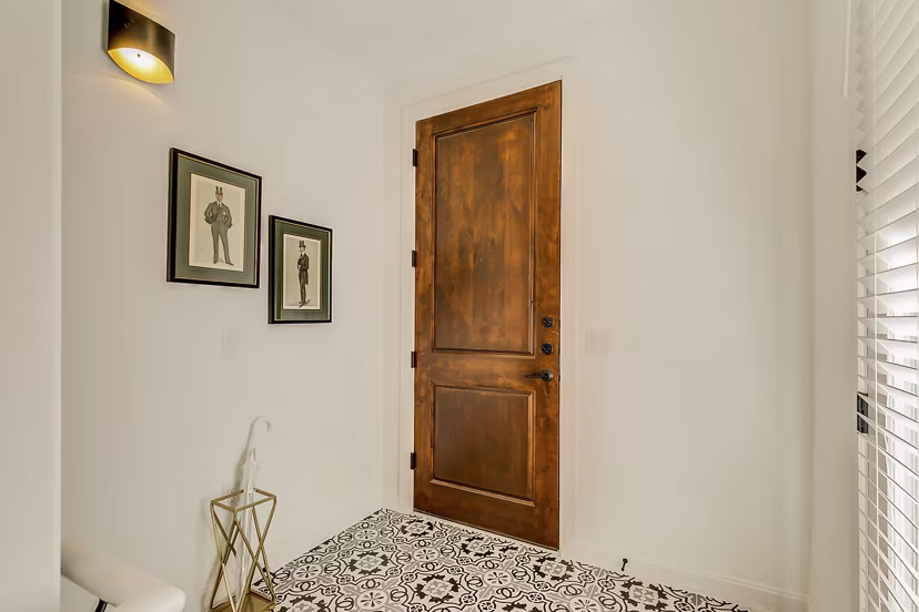 Elegant hallway with modern lighting fixtures at Elan Inwood Apartments