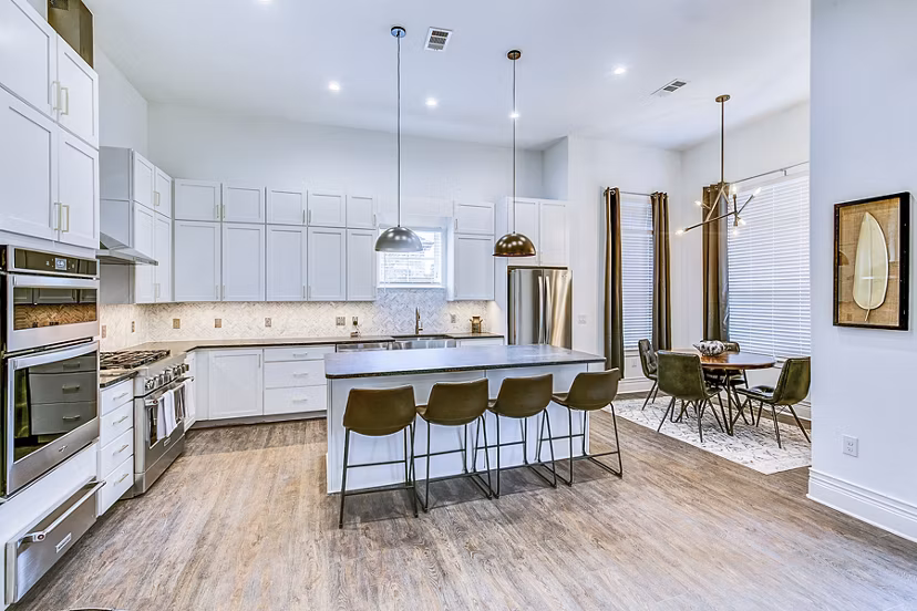 Modern kitchen with stainless steel appliances at Elan Inwood Apartments, a luxury living community by Greystar