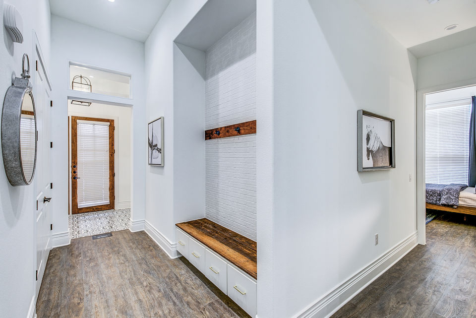 Inviting entryway with modern decor at Elan Inwood Apartments