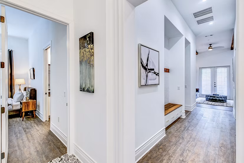 Elan Inwood Apartments: Elegant entryway featuring modern decor and ambient lighting