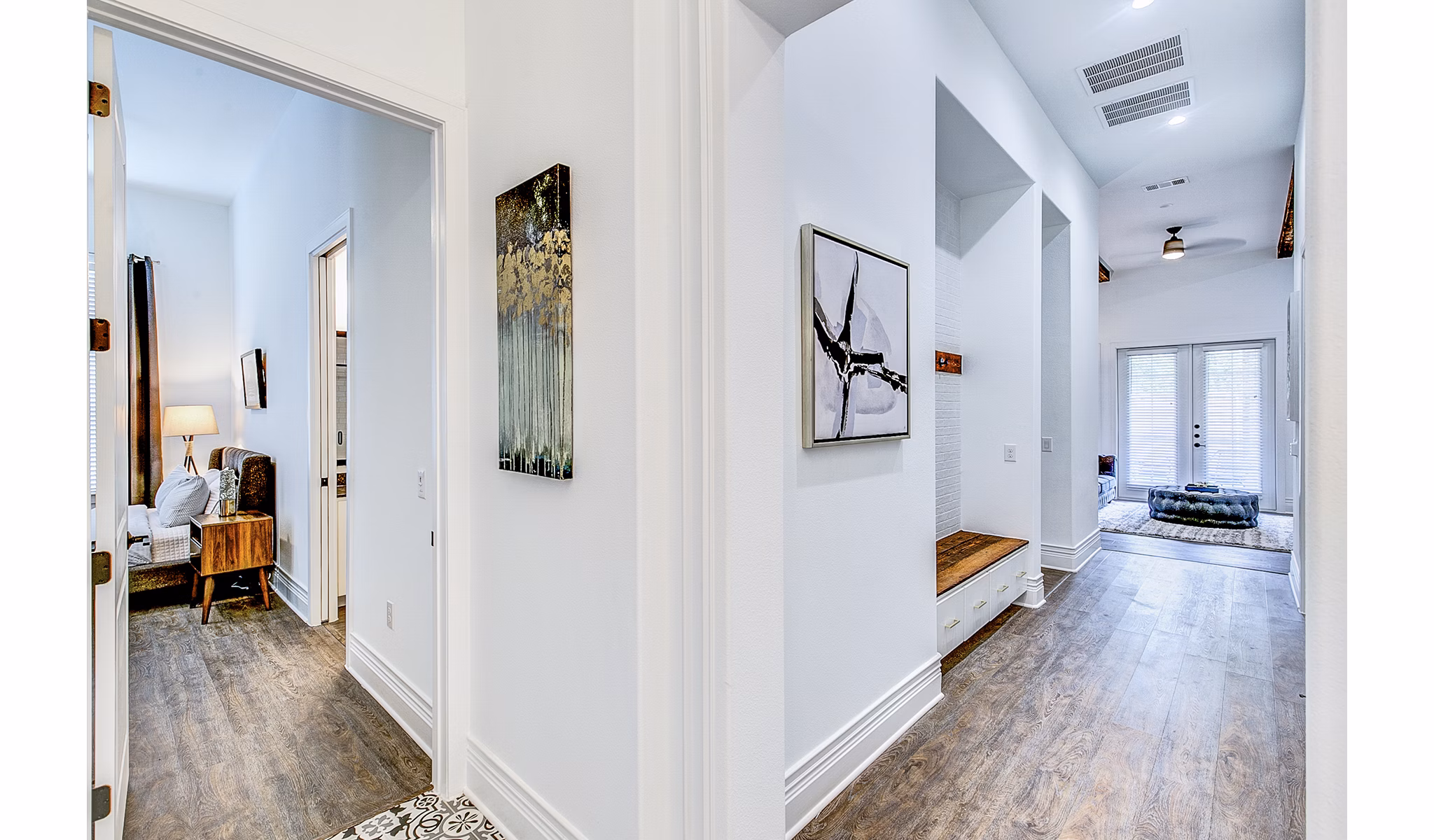 Elan Inwood Apartments: Elegant entryway featuring modern decor and ambient lighting