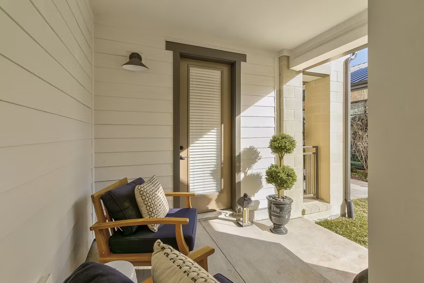 Modern outdoor patio with stylish seating at Elan Inwood Apartments
