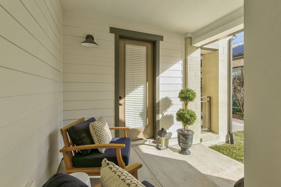 Modern outdoor patio with stylish seating at Elan Inwood Apartments