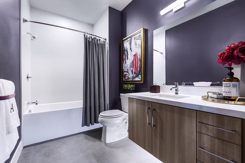 Bathroom featuring sleek design and modern fixtures at AMP Lofts Apartments