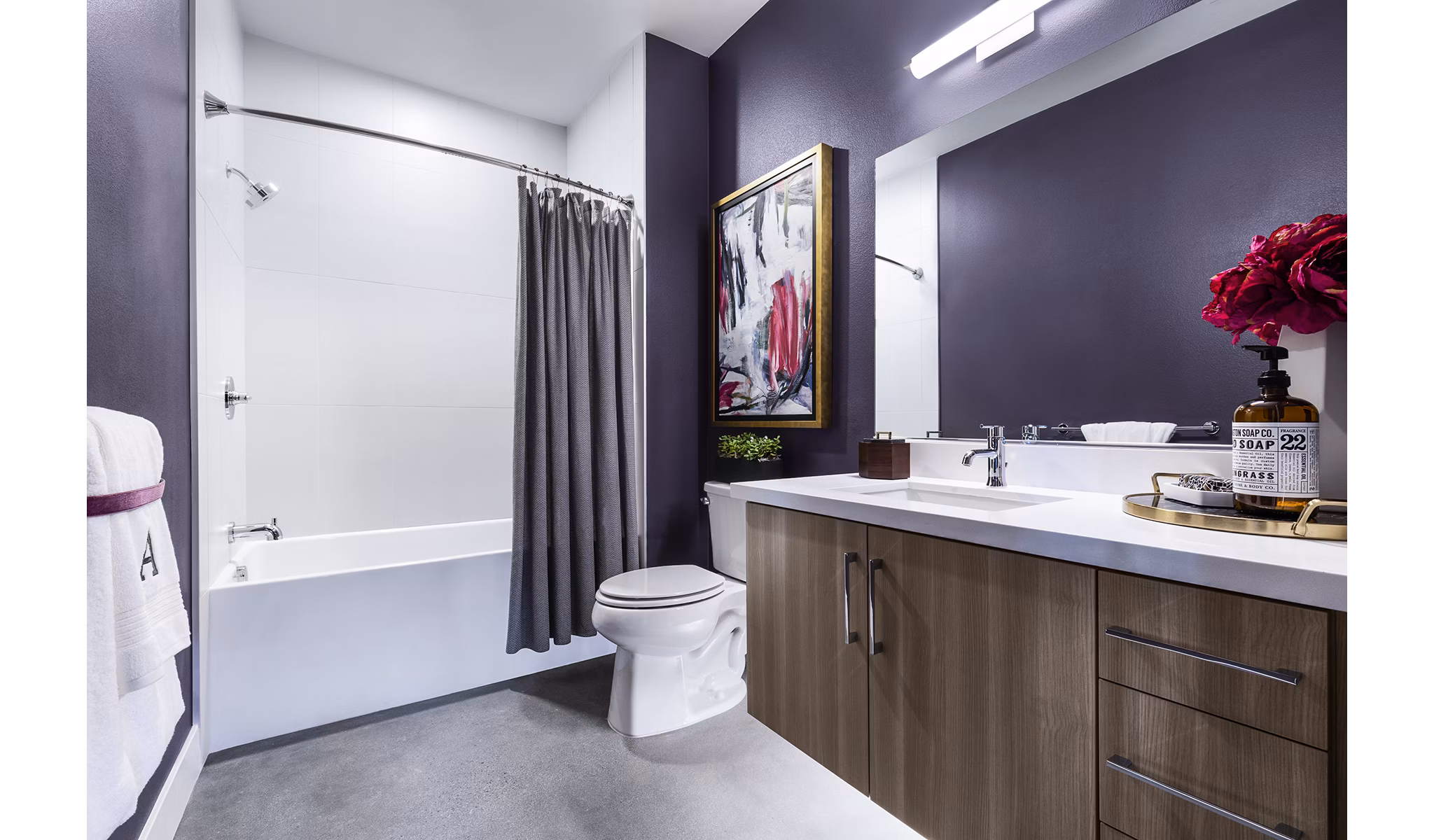 Bathroom featuring sleek design and modern fixtures at AMP Lofts Apartments