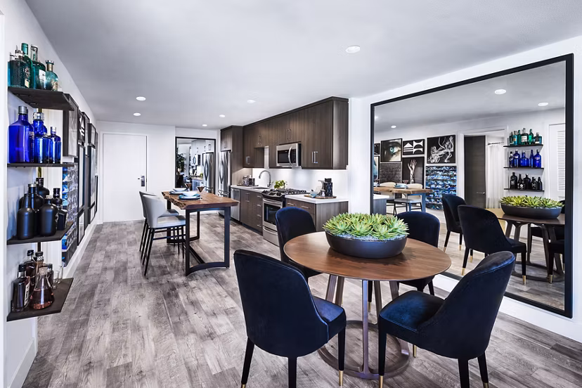 Modern dining room with chic decor in AMP Lofts Apartments offering luxury living spaces