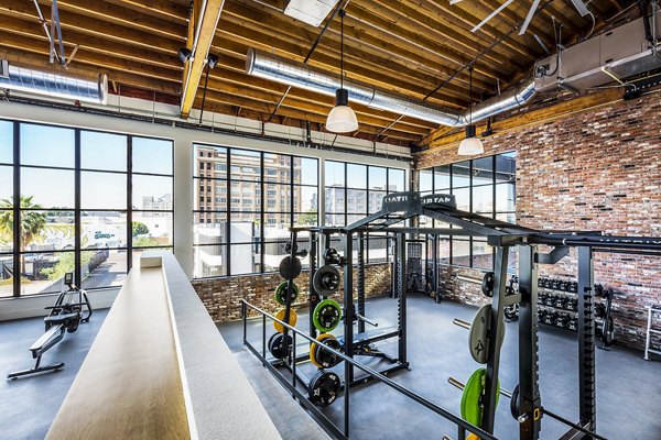 Fitness center with state-of-the-art equipment at AMP Lofts Apartments
