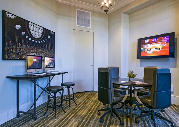 business center at Arlo Westchase Apartments                                               