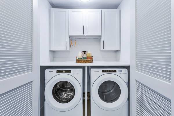  laundry room at Parq on Speer Apartments