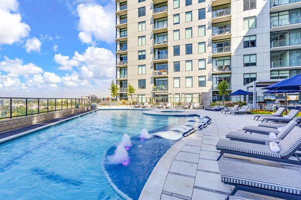Parq on Speer Apartments: High-rise luxury apartments with outdoor pool and lounge chairs in the heart of the city