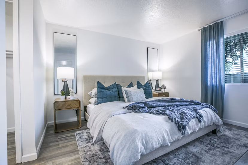 Serene bedroom with modern decor at AYA ABQ Apartments, luxury living in Albuquerque