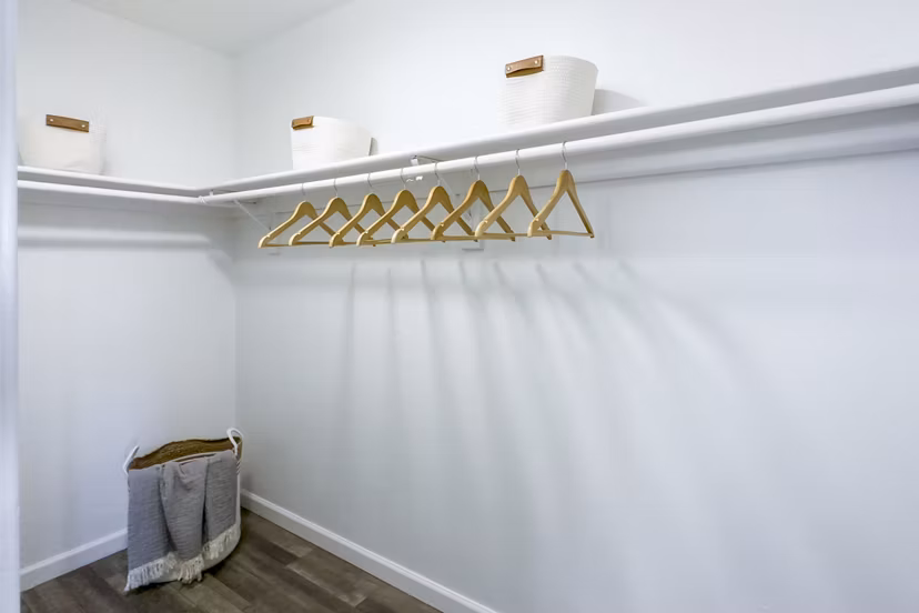 Spacious bedroom closet with ample storage space in AYA ABQ Apartments