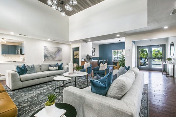 Clubhouse lobby with modern seating and decor at AYA ABQ Apartments