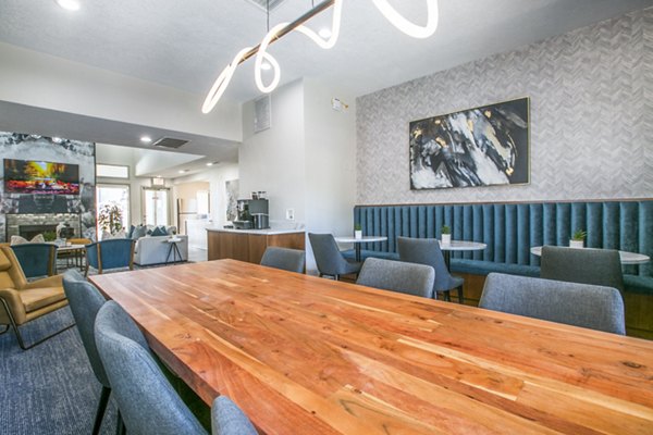 AYA ABQ Apartments: Modern clubhouse lobby with stylish seating and bright lighting in Greystar luxury apartments