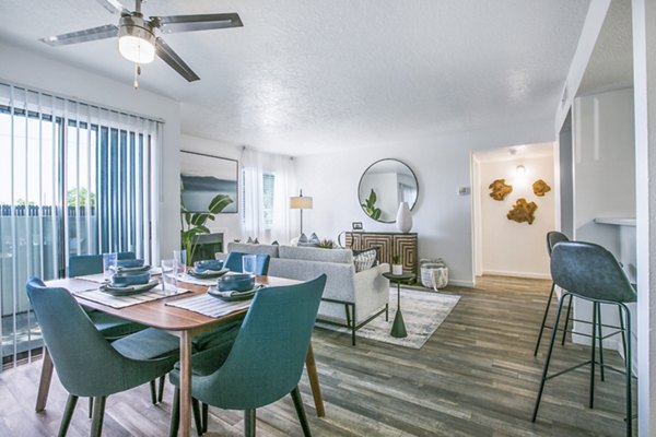 Dining area with modern furnishings at AYA ABQ Apartments