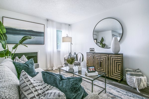 Contemporary living room featuring elegant decor and natural light at AYA ABQ Apartments
