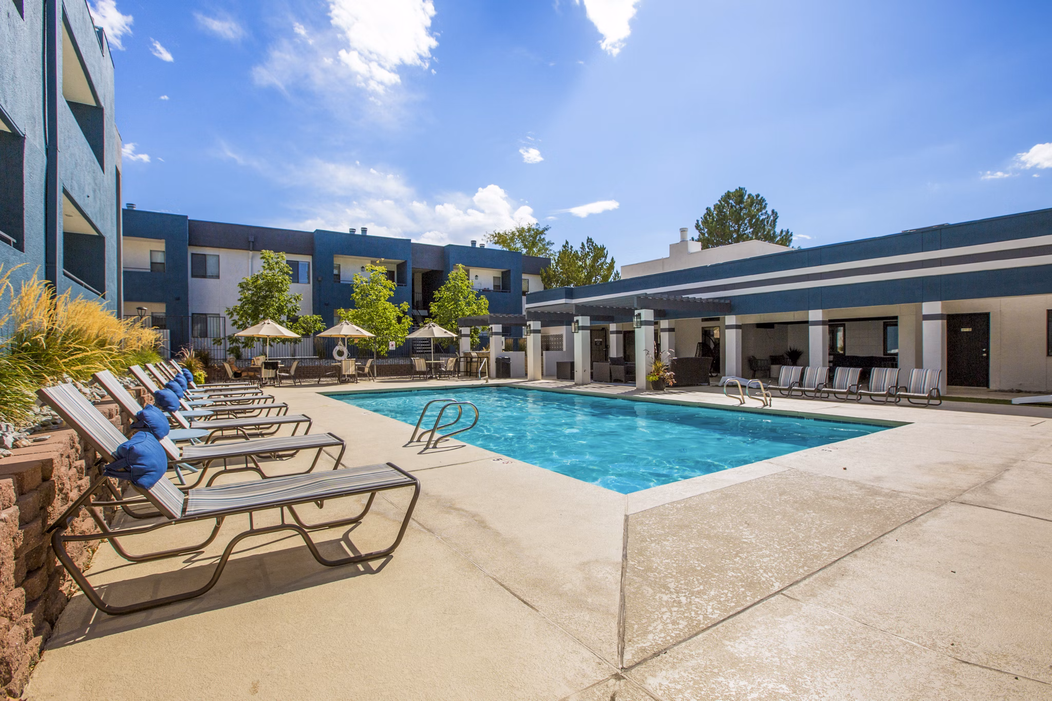 Luxurious poolside view at AYA ABQ Apartments perfect for relaxation and leisure