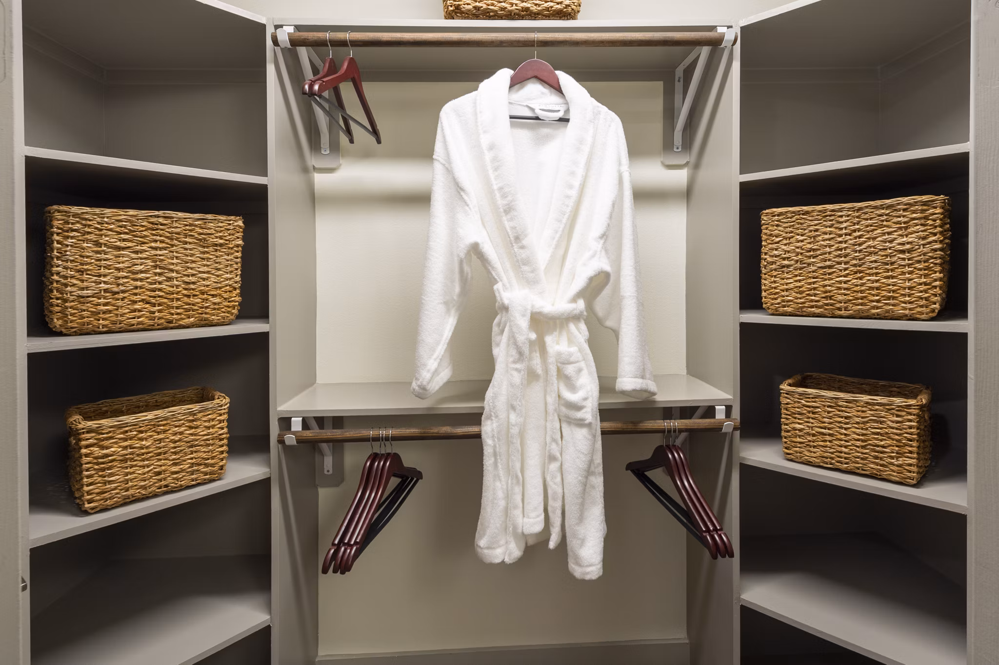 Walk-in closet with abundant storage space in 1414 Texas Downtown Apartments