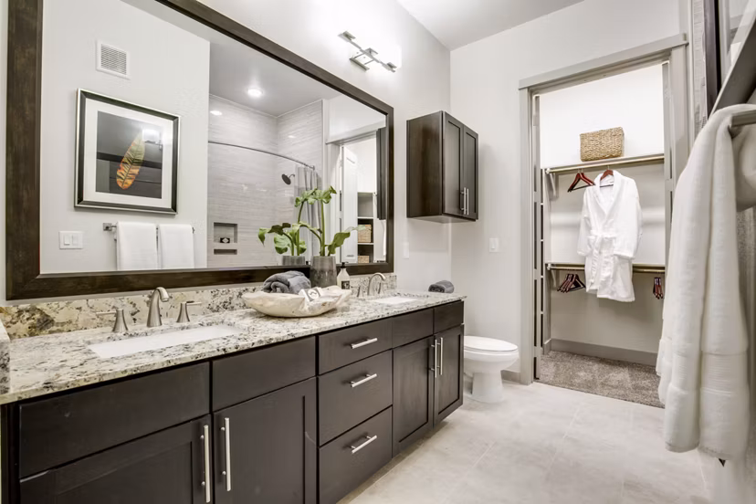 Luxurious bathroom with modern fixtures at 1414 Texas Downtown Apartments