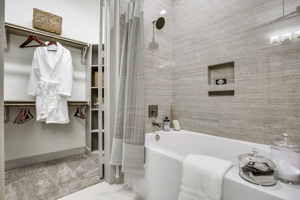 Modern bathroom with sleek fixtures at 1414 Texas Downtown Apartments