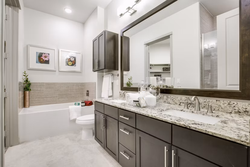 Bathroom with modern fixtures and sleek design at 1414 Texas Downtown Apartments in vibrant central location