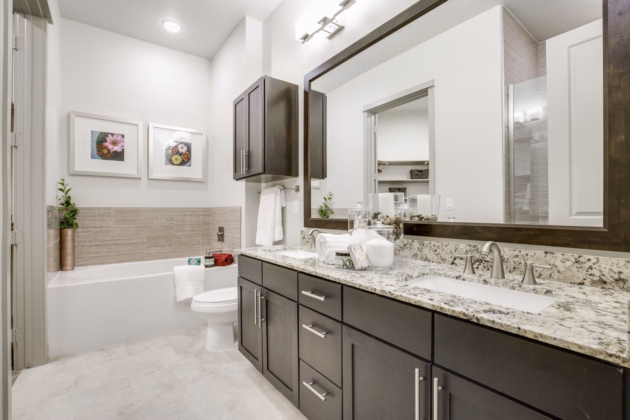 Bathroom with modern fixtures and sleek design at 1414 Texas Downtown Apartments in vibrant central location