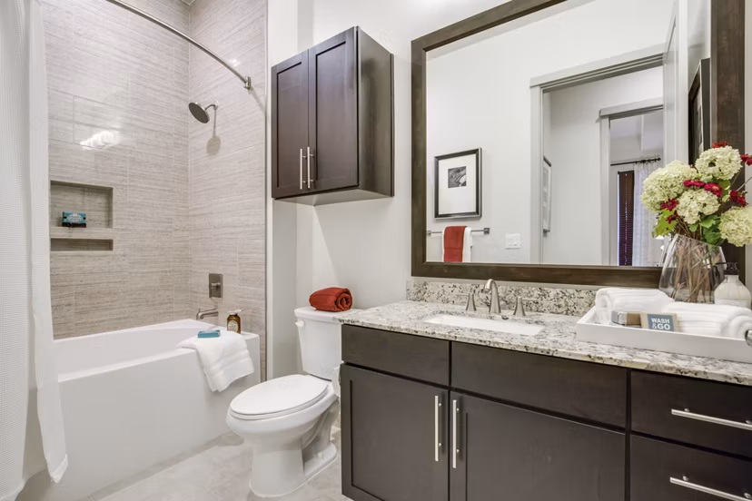 Luxurious bathroom with contemporary fixtures at 1414 Texas Downtown Apartments in Houston