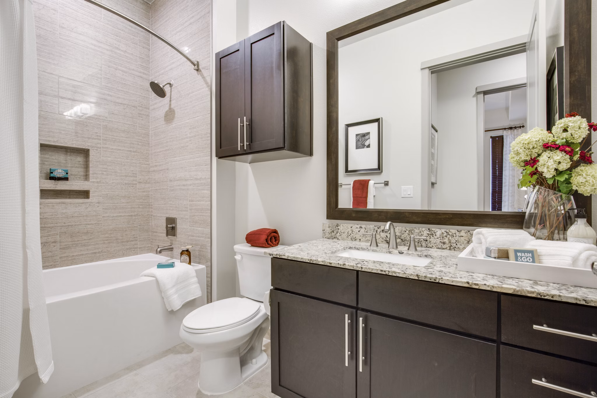 Luxurious bathroom with contemporary fixtures at 1414 Texas Downtown Apartments in Houston