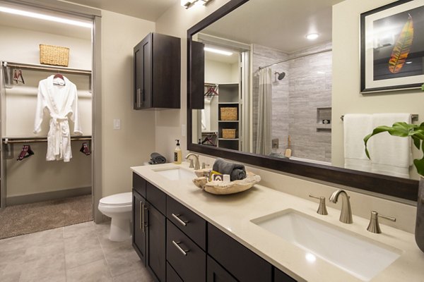 Elegant bathroom with modern fixtures at 1414 Texas Downtown Apartments