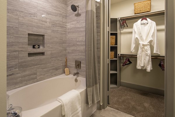 Elegant bathroom with modern fixtures at 1414 Texas Downtown Apartments
