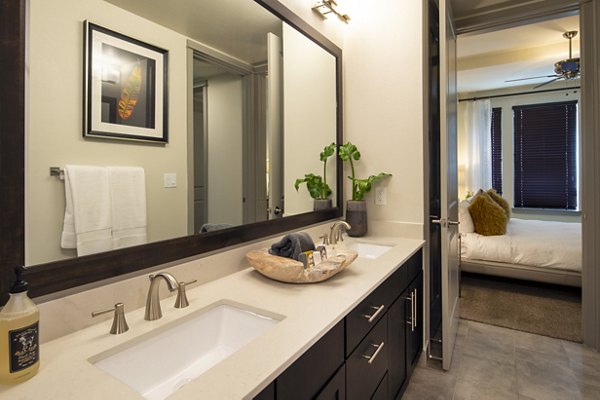 Luxury bathroom featuring modern fixtures at 1414 Texas Downtown Apartments