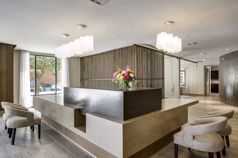 Clubhouse with modern decor at 1414 Texas Downtown Apartments, featuring luxurious seating areas and entertainment spaces