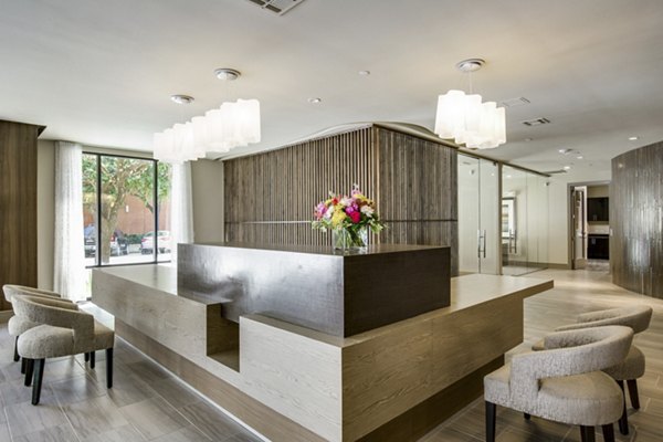 Clubhouse with modern decor at 1414 Texas Downtown Apartments, featuring luxurious seating areas and entertainment spaces