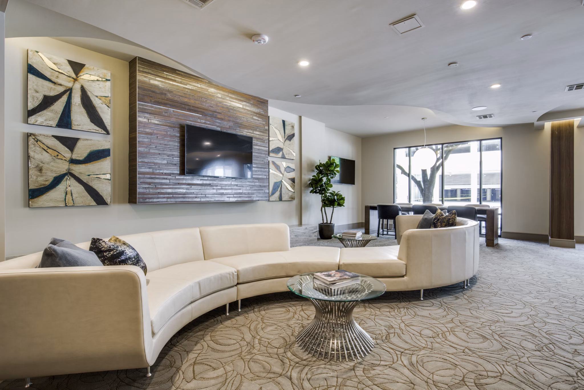 Clubhouse featuring modern lounge and game room at 1414 Texas Downtown Apartments in vibrant urban setting