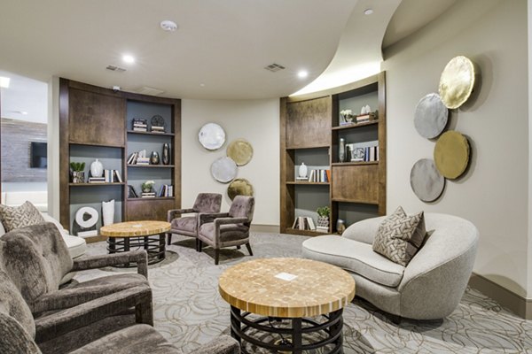 Modern clubhouse with stylish seating and entertainment options at 1414 Texas Downtown Apartments