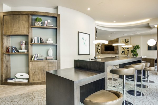 Modern clubhouse featuring stylish seating and billiards at 1414 Texas Downtown Apartments