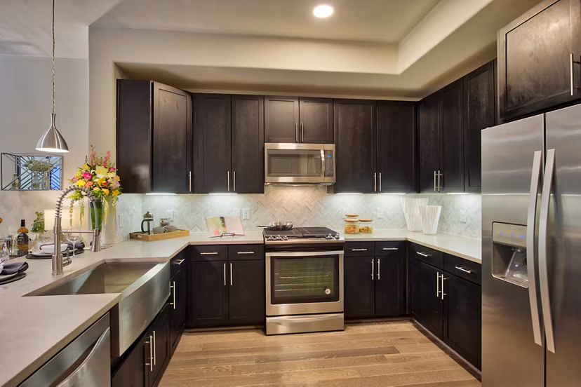 Modern kitchen with stainless steel appliances at 1414 Texas Downtown Apartments