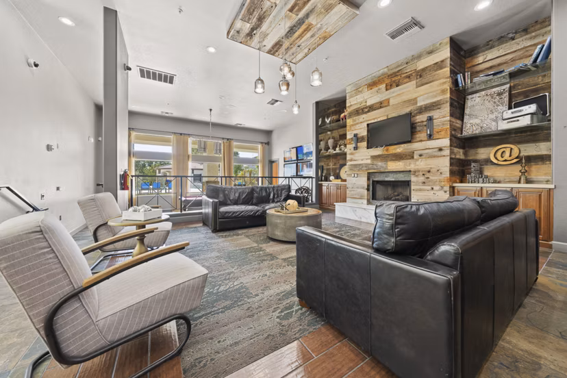 Mail room at Bella Mirage Apartments featuring secure package lockers and modern design