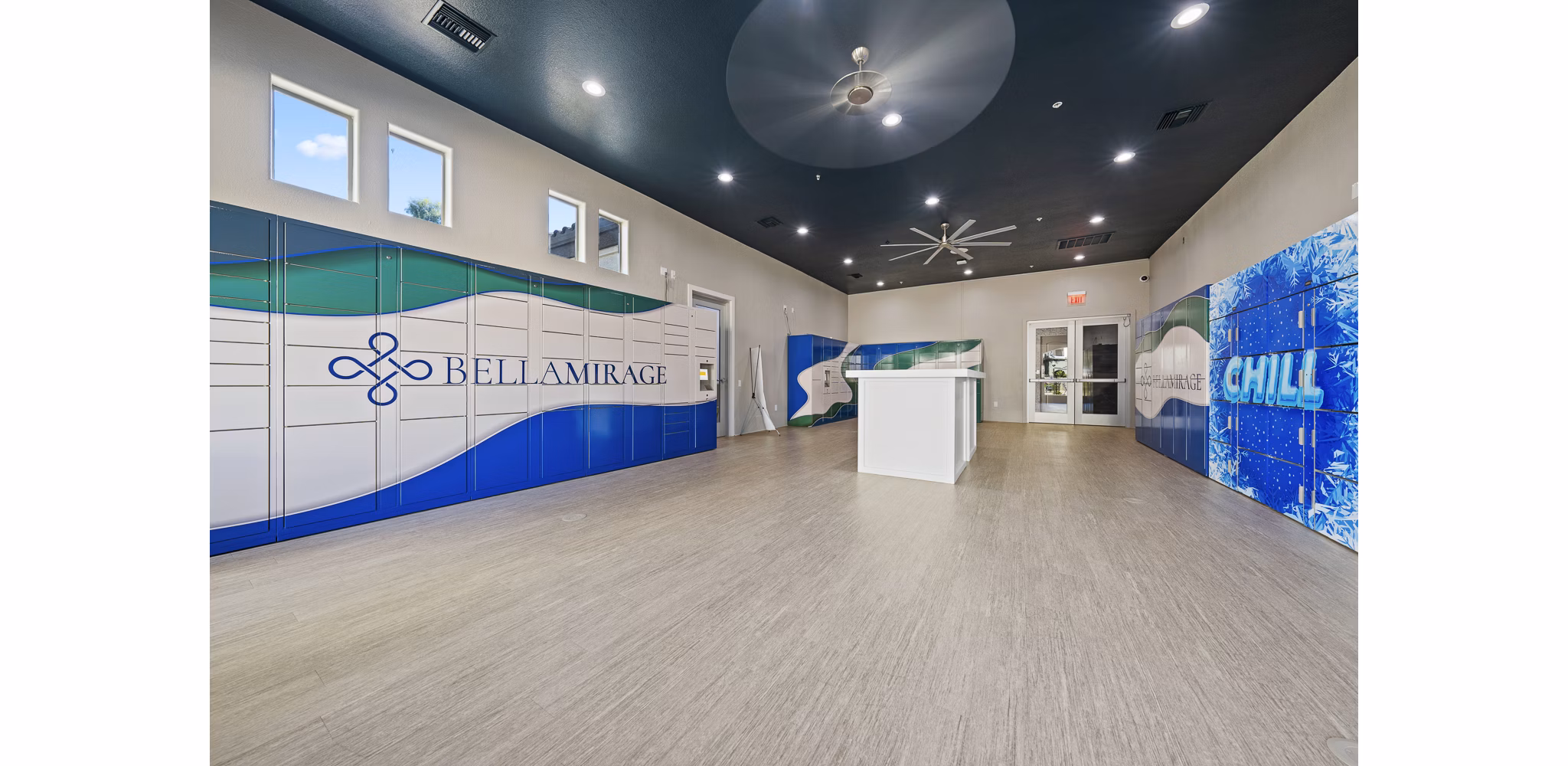 Mail room at Bella Mirage Apartments featuring secure package lockers and modern design