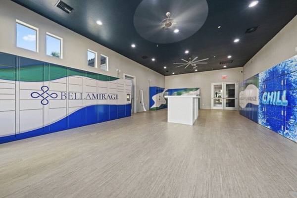 Mail room at Bella Mirage Apartments featuring secure package lockers and modern design