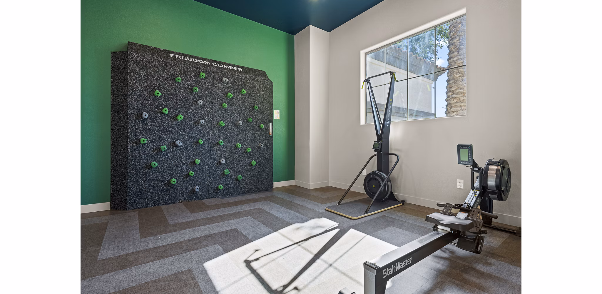 State-of-the-art fitness center with modern equipment at Bella Mirage Apartments