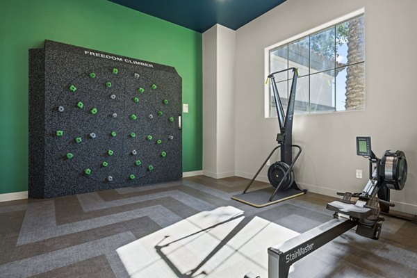 State-of-the-art fitness center with modern equipment at Bella Mirage Apartments