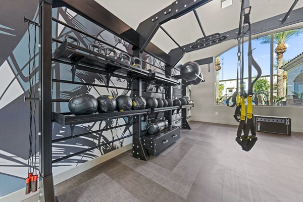 State-of-the-art fitness center at Bella Mirage Apartments with modern equipment for resident wellness