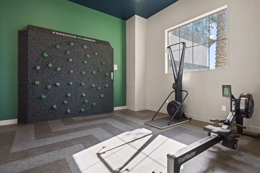 Fitness center with modern equipment at Bella Mirage Apartments